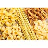 Variety of types and shapes of dry Italian pasta