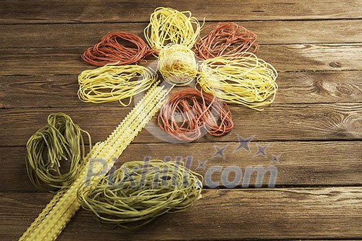 Close of dry spaghetti pasta on table Close of dry spaghetti pasta on table