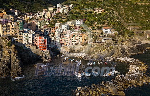 Riomaggiore of Cinque Terre, Italy - Traditional fishing village in La Spezia, situate in coastline of Liguria of Italy. Riomaggiore is one of the five Cinque Terre travel attractions.