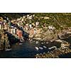 Riomaggiore of Cinque Terre, Italy - Traditional fishing village in La Spezia, situate in coastline of Liguria of Italy. Riomaggiore is one of the five Cinque Terre travel attractions.