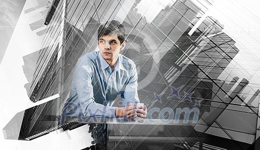 Double exposure of businessman and modern cityscape. Mixed media Double exposure of businessman and modern cityscape. Mixed media