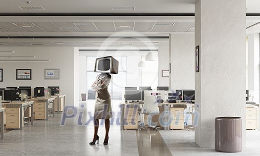 Elegant businesswoman with TV monitor instead of head. Mixed media Elegant businesswoman with TV monitor instead of head. Mixed media