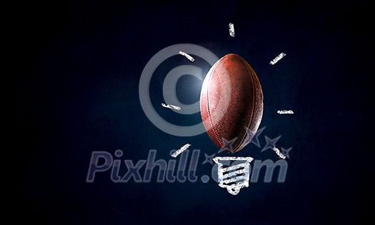 Light bulb and ball as sign for creativity Light bulb and ball as sign for creativity
