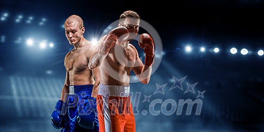 Two boxers fighting in lights of arena. Mixed media Two boxers fighting in lights of arena. Mixed media