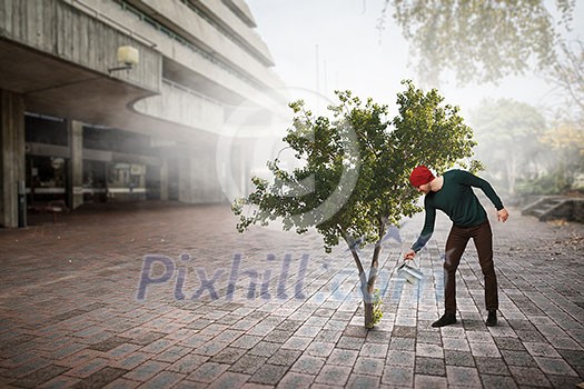 Hipster guy water green tree with metal can. Mixed media Hipster guy water green tree with metal can. Mixed media