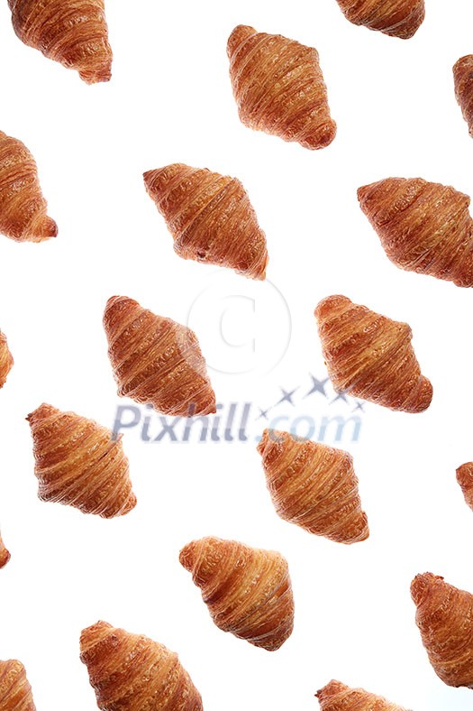 Food pattern with freshly baked homemade delicious croissants on a white background. Food pattern with freshly baked homemade delicious croissants on a white background.