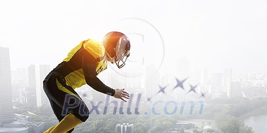 American football player against modern city background