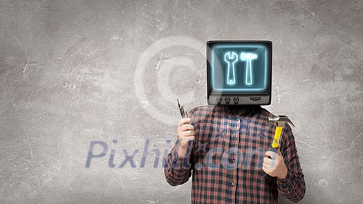 Man with TV monitor instead of head using tablet pc. Mixed media Man with TV monitor instead of head using tablet pc. Mixed media