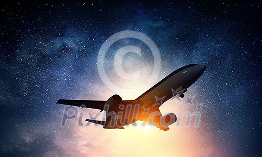 Airplane for transportation flying in night sky