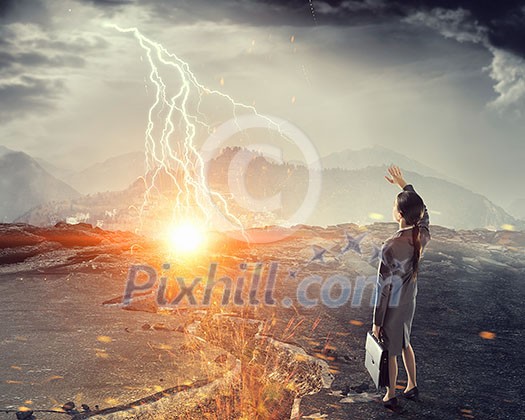 Businesswoman outdoors on asphalt cracked road. Mixed media Businesswoman outdoors on asphalt cracked road. Mixed media