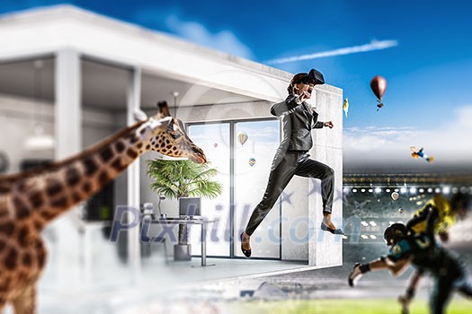 Woman experiencing football game in virtual reality. Mixed media Woman experiencing football game in virtual reality. Mixed media