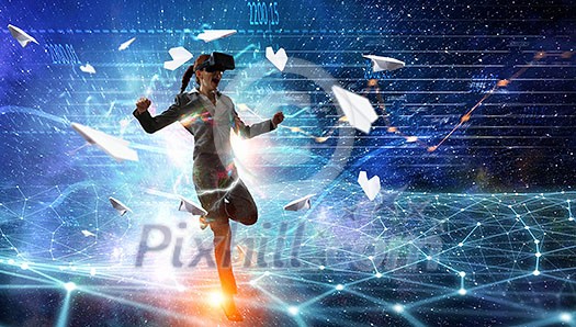 Woman in helmet experiencing virtual reality. Mixed media Woman in helmet experiencing virtual reality. Mixed media