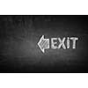 Exit word drawn with chalk on concrete wall