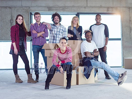 portrait of young multiethnic business team,architect and engineer on construction site while checking documents and business workflow in new startup office