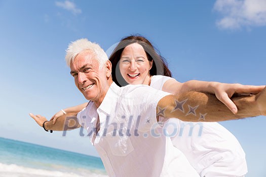 Couple having fun on the beach