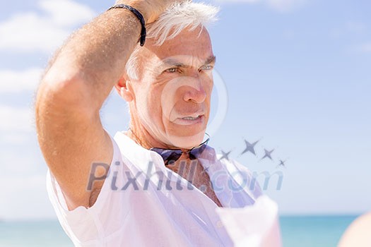 Handsome man on the beach 