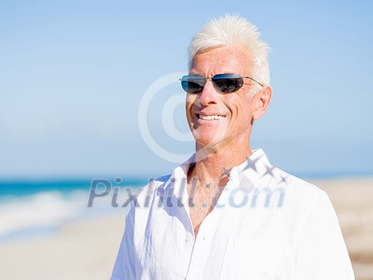 Handsome man on the beach 