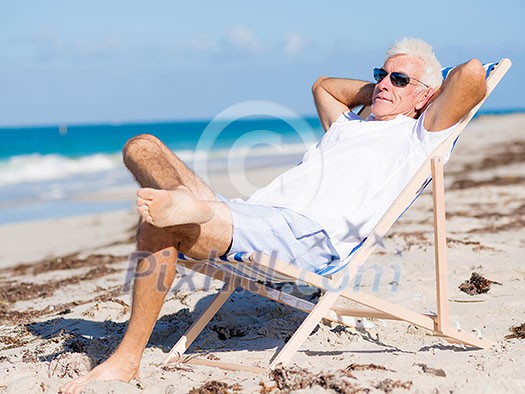 Handsome man on the beach 