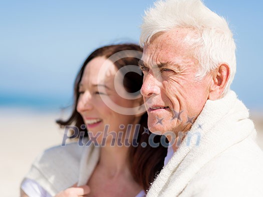 Happy couple together on the beach