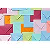 Colorful decorative background from handmade blank envelopes as a pattern.