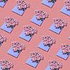 Flowers in the shape of hearts in the handmade envelopes on a pastel background. Creative greeting pattern.