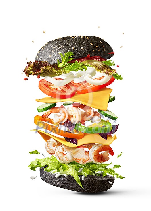 Homemade delicious sandwich of flying ingredients shrimp, fresh organic vegetables and black bun on a white background with copy space. Homemade delicious sandwich of flying ingredients shrimp, fresh organic vegetables and black bun on a white background with copy space.
