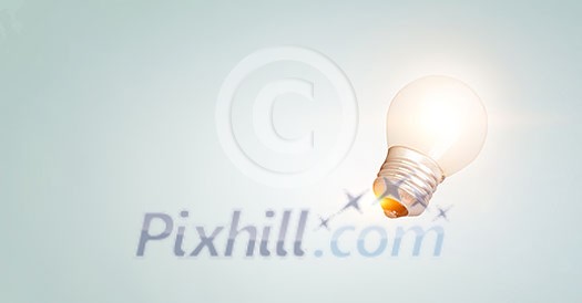 Glowing light bulb as creative idea concept. Mixed media Glowing light bulb as creative idea concept. Mixed media