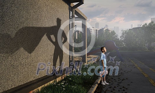 Cute kid with plush bear and hero shadow on his background. Mixed media