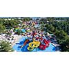 colorful water park aquapark water splash aerial top view of happy unidentified people and kids having fun and get relaxed
