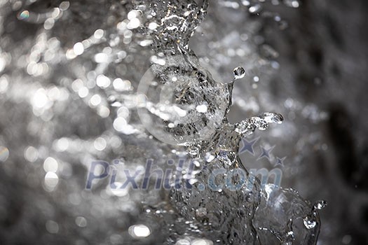 Water concept - river water flowing with light reflecting of its surface - fast exposure shot Water concept - river water flowing with light reflecting of its surface - fast exposure shot