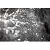 Water concept - river water flowing with light reflecting of its surface - fast exposure shot