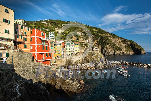 Riomaggiore of Cinque Terre, Italy - Traditional fishing village in La Spezia, situate in coastline of Liguria of Italy. Riomaggiore is one of the five Cinque Terre travel attractions.