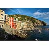 Riomaggiore of Cinque Terre, Italy - Traditional fishing village in La Spezia, situate in coastline of Liguria of Italy. Riomaggiore is one of the five Cinque Terre travel attractions.