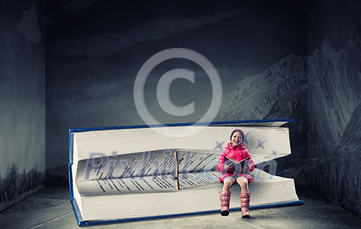 Happy child little girl reading book. Mixed media Happy child little girl reading book. Mixed media
