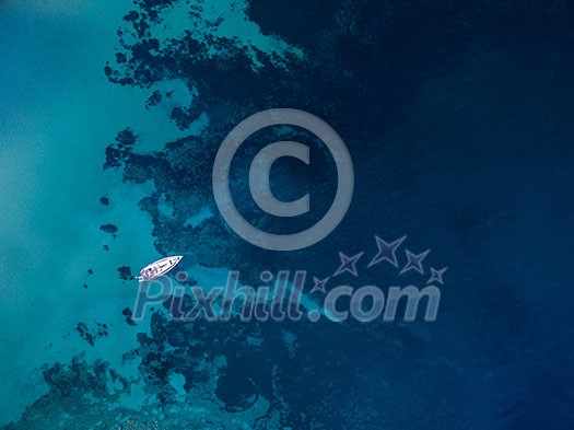 Scenic Sardinia island landscape. Italy sea ​​coast with azure clear water. Nature background from above - aerial image Scenic Sardinia island landscape. Italy sea ​​coast with azure clear water. Nature background from above - aerial image