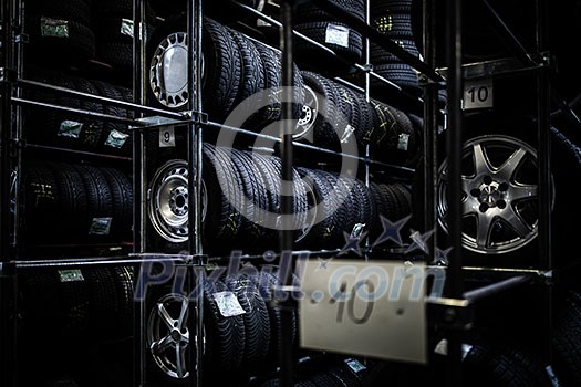 Tyres being stored in a garage - waiting for the client to have them put on his car