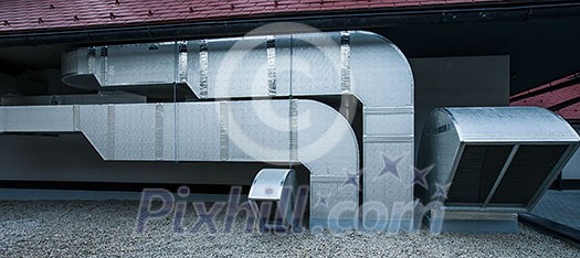 Air conditioning equipment atop a modern building - aerial/drone view of the roof with all the necessary installations Air conditioning equipment atop a modern building - aerial/drone view of the roof with all the necessary installations