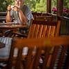 Handsome senior man enjoying his morning coffee on a mountain hotel terrace, while on vacation