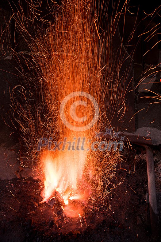 Traditional blacksmith furnace with burning fire
Burning fire in furnace at forge, workshop. Blacksmith equipment concept Traditional blacksmith furnace with burning fire
Burning fire in furnace at forge, workshop. Blacksmith equipment concept