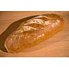 top view of fresh bread on wooden table