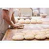 baker preparing the dough for products In a traditional bakery