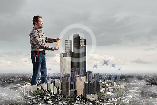Builder man in checked shirt with tool belt on waist Builder man in checked shirt with tool belt on waist