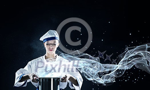 Pretty woman cook in hat and apron with pot in hands Pretty woman cook in hat and apron with pot in hands