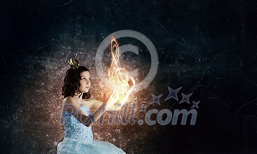 Little girl princess in blue dress with diadem on head Little girl princess in blue dress with diadem on head