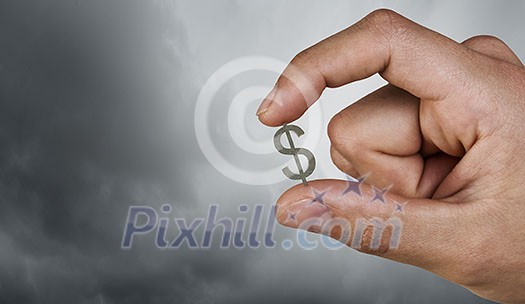 Tiny dollar currency sign holden between fingers Tiny dollar currency sign holden between fingers