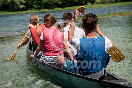 friend together as a tem canuing in beautiful river