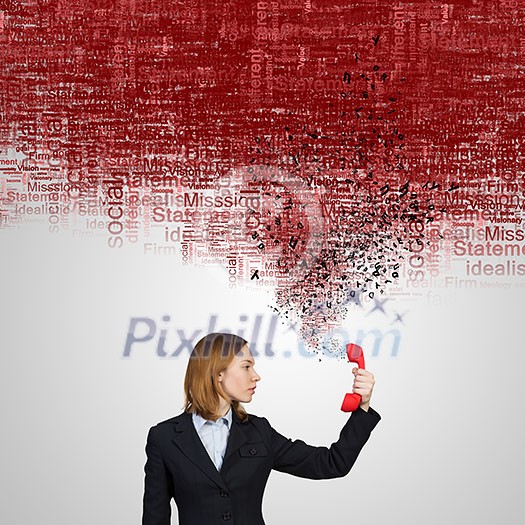 Young businesswoman with red phone receiver in hands Young businesswoman with red phone receiver in hands