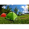 calm relaxing camp tent near the beautiful river on sunny summer day