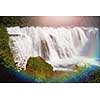 waterfall in beautiful nature with crystal clear water on wild river una in bosnia and herzegovina at sunny summer day