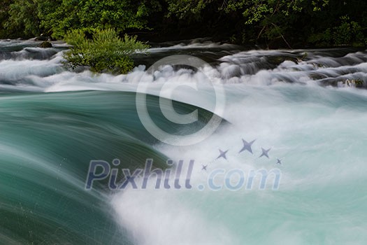 waterfall in beautiful nature with crystal clear water on wild river una in bosnia and herzegovina at sunny summer day